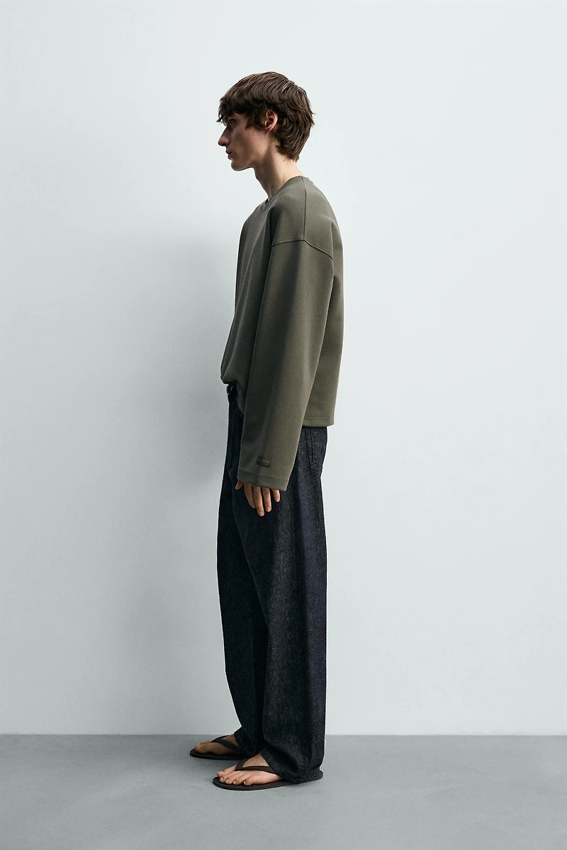 INTERLOCK CROPPED FIT SWEATSHIRT