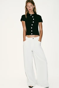 ASYMMETRIC CLOSURE KNIT TOP
