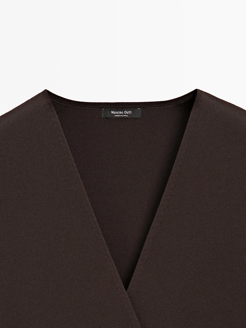 Crossover knit vest with tie detail