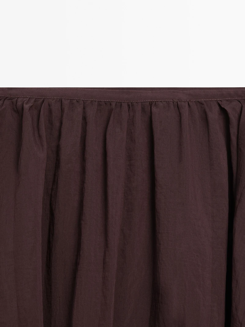 Pleated balloon midi skirt