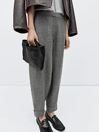 Balloon fit trousers with button details