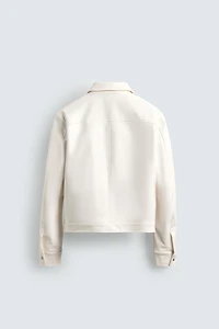 BLOUSON EN MATIÈRE SYNTHÉTIQUE BRILLANT