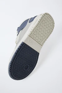 MULTI-PIECE HIGH TOP SNEAKERS
