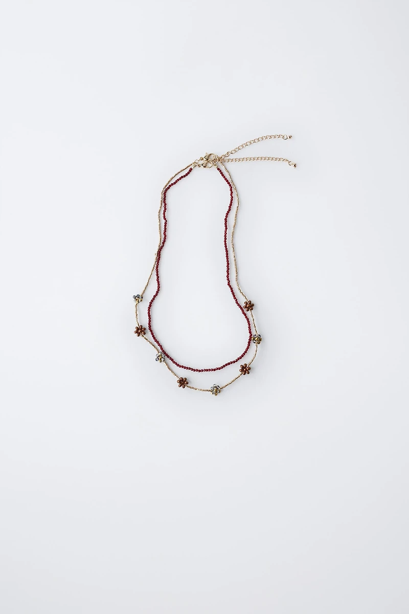 TWO-PACK OF BEADED FLOWER NECKLACES