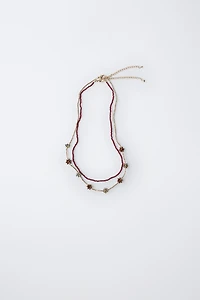 TWO-PACK OF BEADED FLOWER NECKLACES