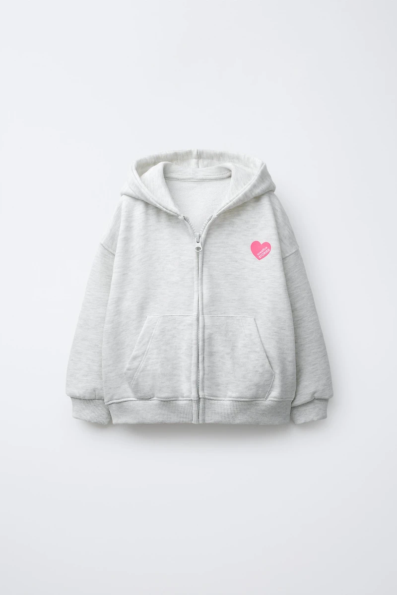 SWEAT ZIPPÉ IMPRIMÉ CŒUR
