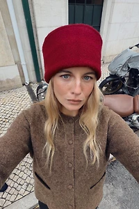 GILET EN MAILLE À BOUTON REVÊTU