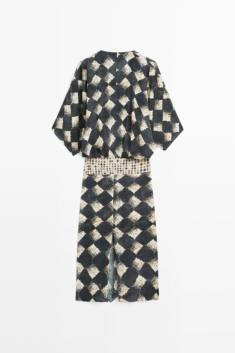 Flowing dress with sash belt detail