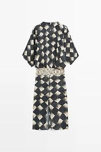 Flowing dress with sash belt detail