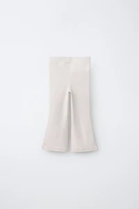 LEGGING FLARE INTERLOCK DÉCOR ÉTIQUETTE