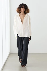 Flowing blouse with seam details