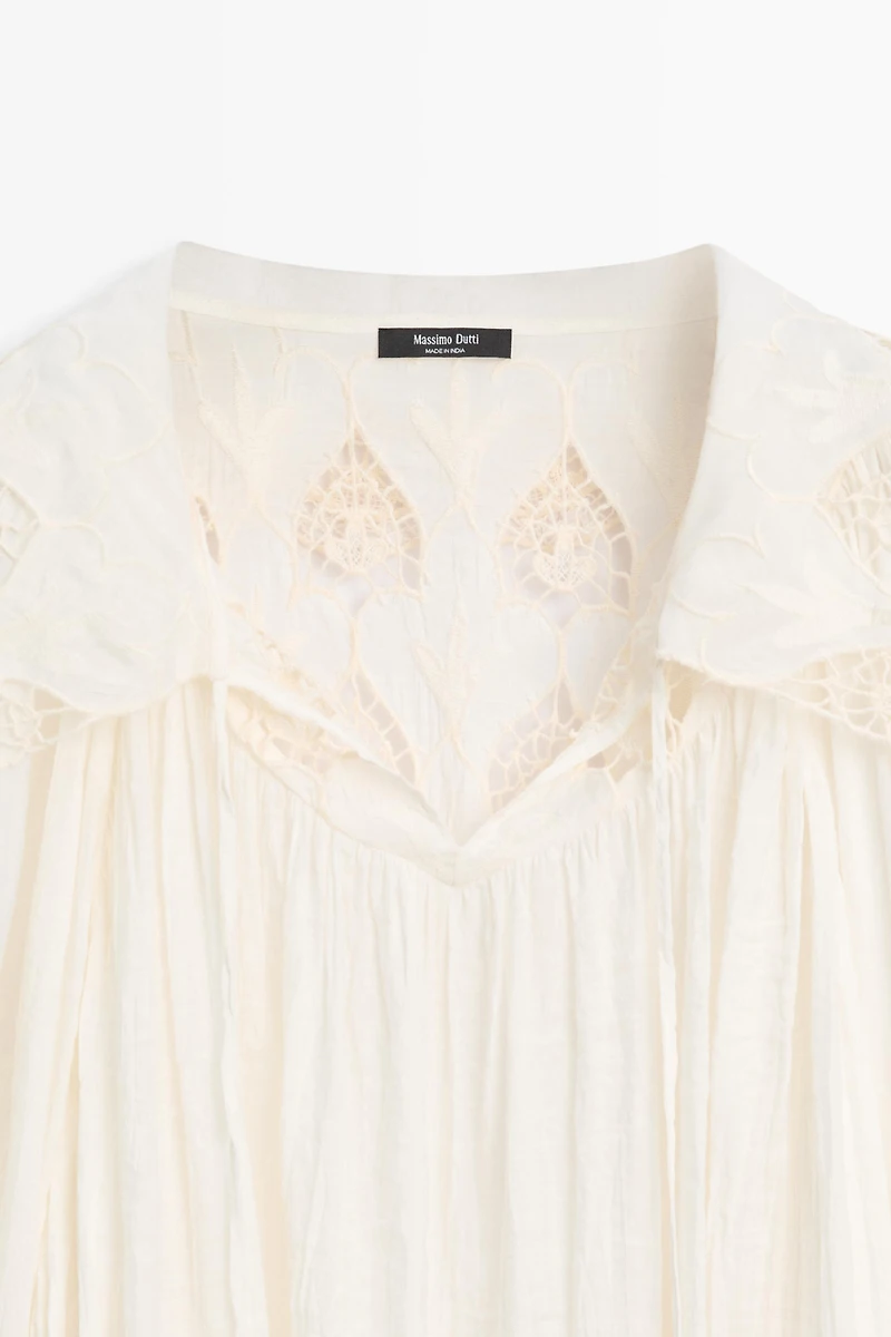 Embroidered flowing blouse