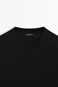 Fine knit round neck sweater