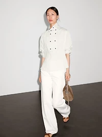 Flowing shirt with button detail on the chest