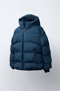 MANTEAU REMBOURRÉ ÉTIQUETTE DÉPERLANT
