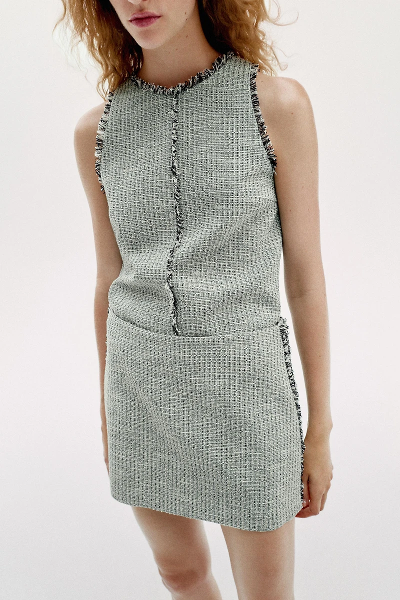 TEXTURED FRAYED MINI SKIRT
