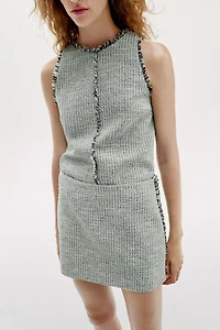TEXTURED FRAYED MINI SKIRT
