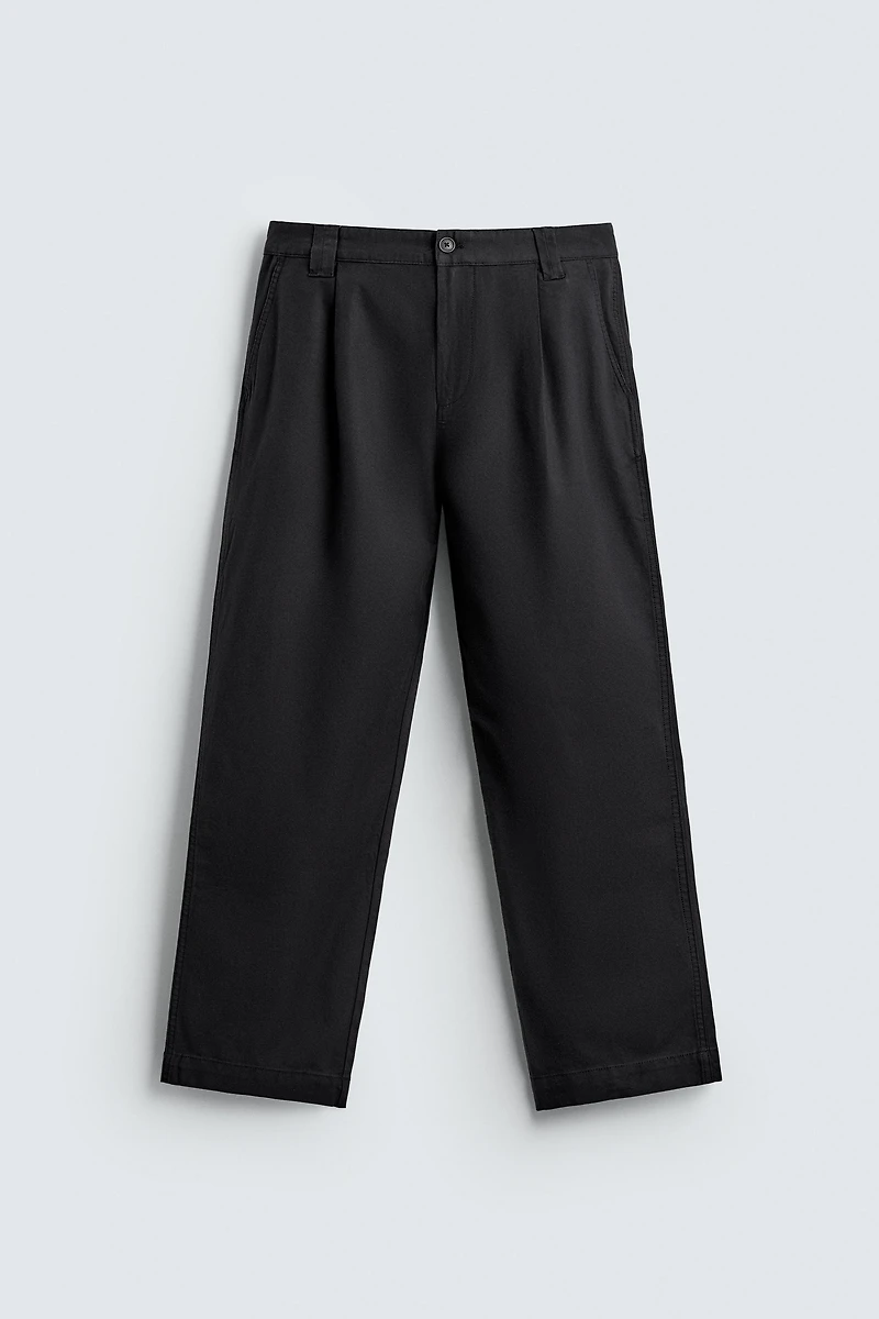RELAXED FIT PLEATED PANTS