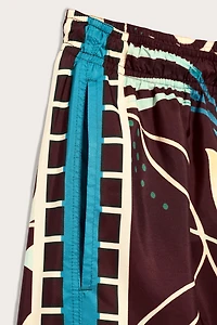 LIMITED EDITION MIXED PRINT SWIM SHORTS