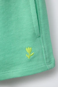 EMBROIDERED PLUSH SHORTS