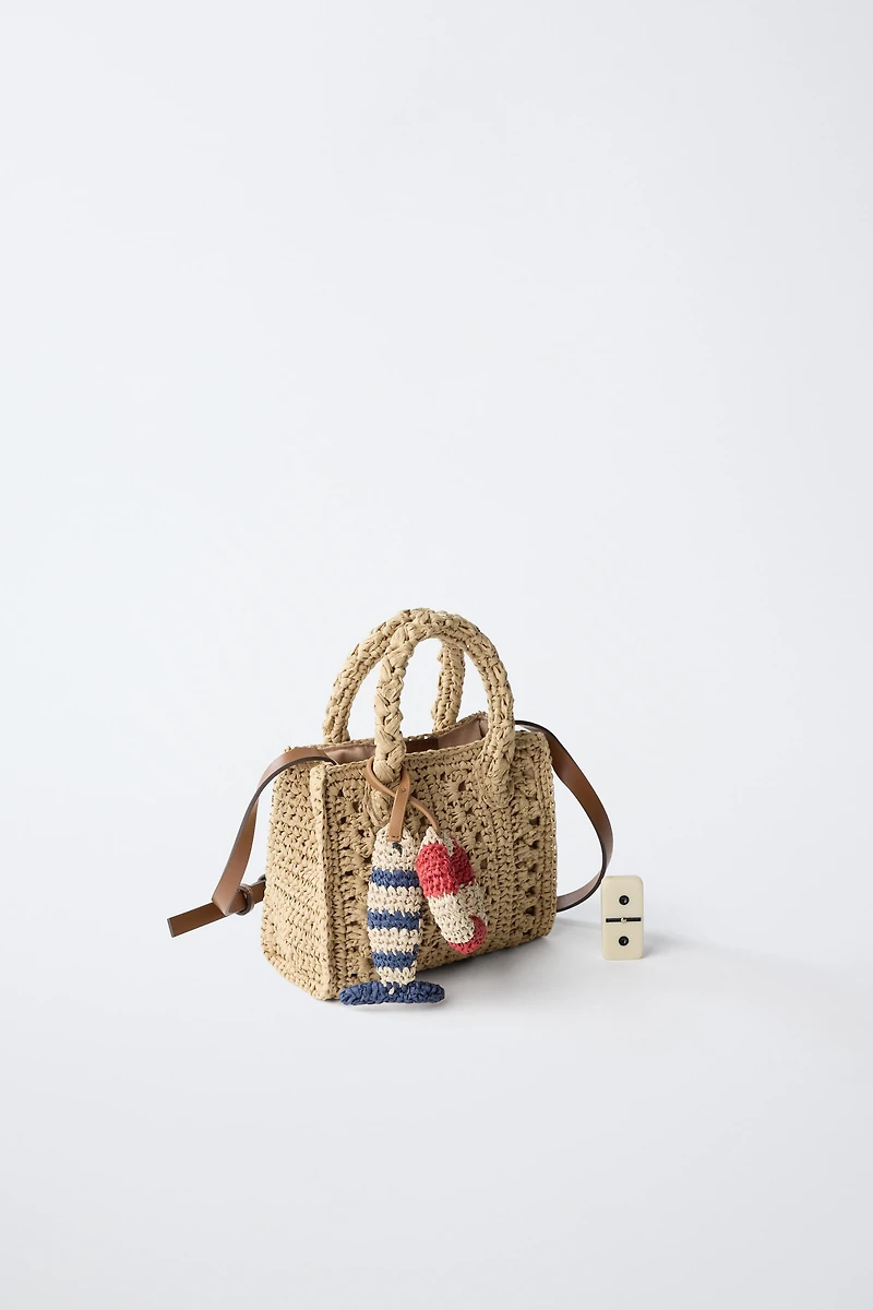 RAFFIA CROSSBODY BAG WITH MARINE CHARMS