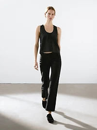Flared trousers with waist detail