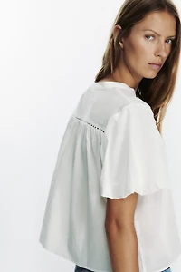 BLOUSE À MANCHES BOUFFANTES