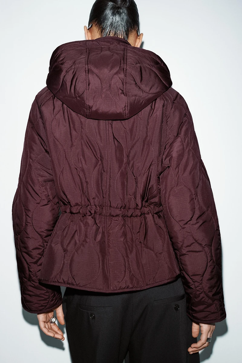BLOUSON REMBOURRÉ À CAPUCHE