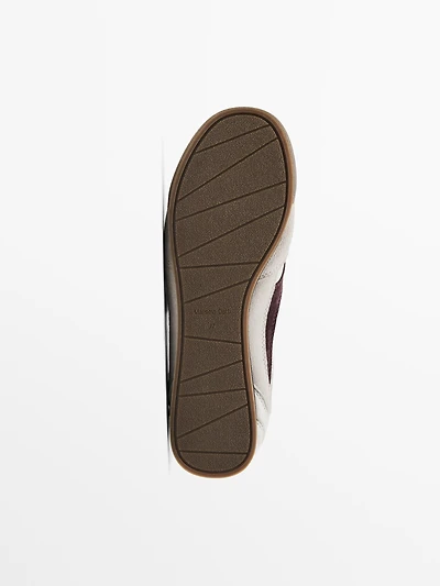 Tennis cuir contrastant