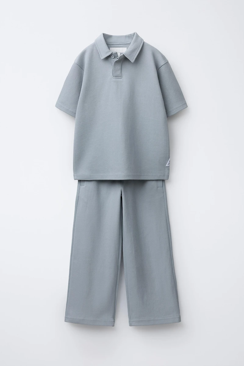 INTERLOCK PIQUÉ POLO AND PANTS SET