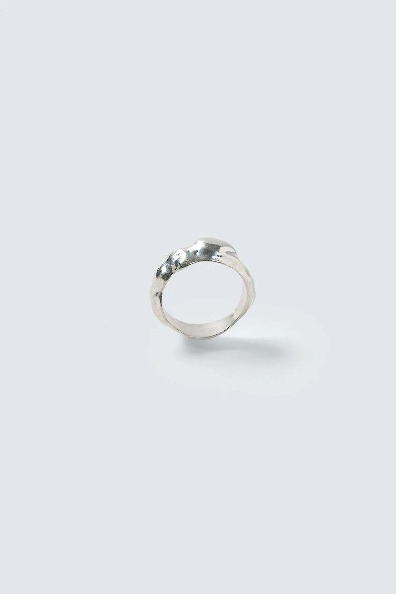 IRREGULAR METAL RING