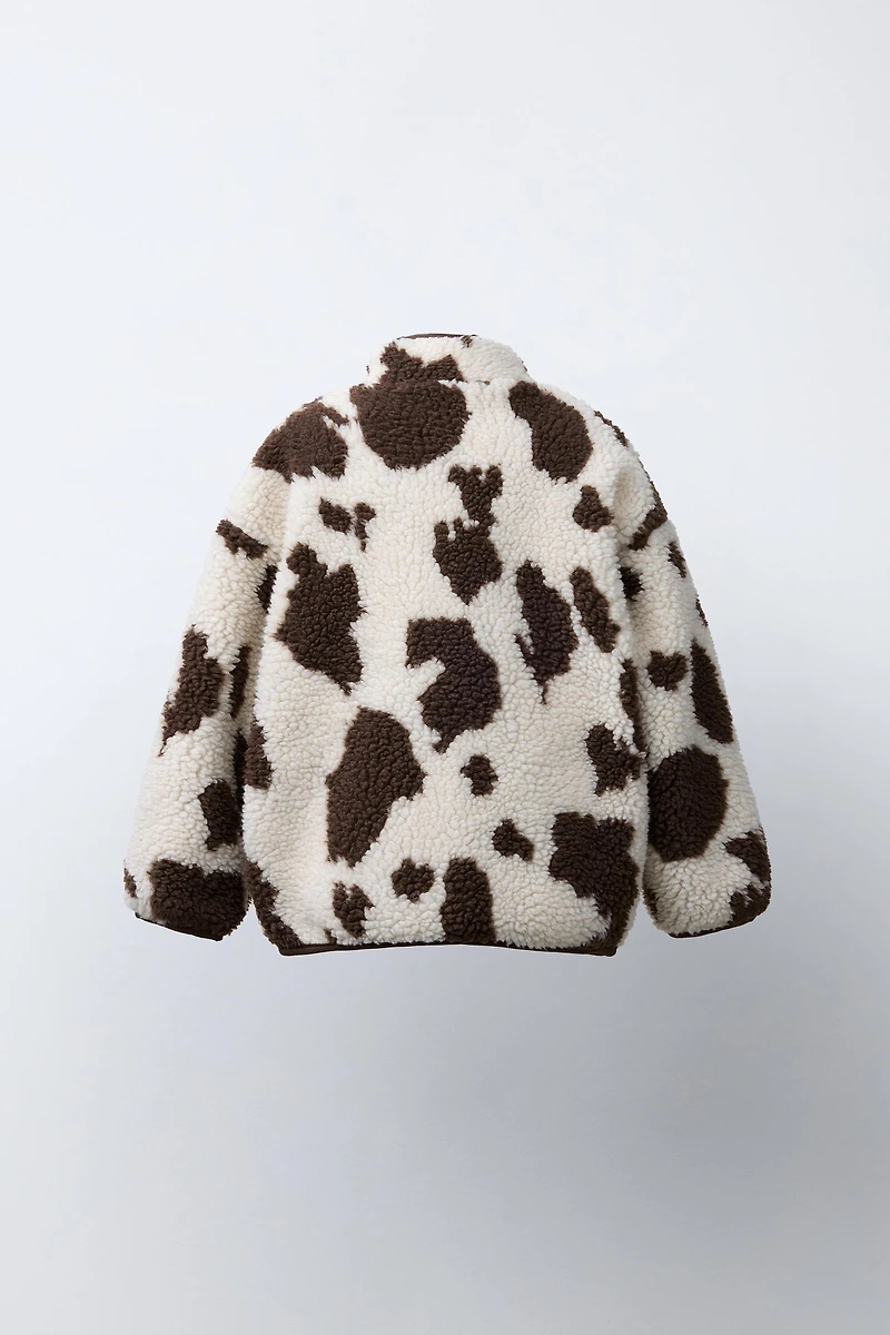 VESTE EFFET MOUTON IMPRIMÉ VACHE