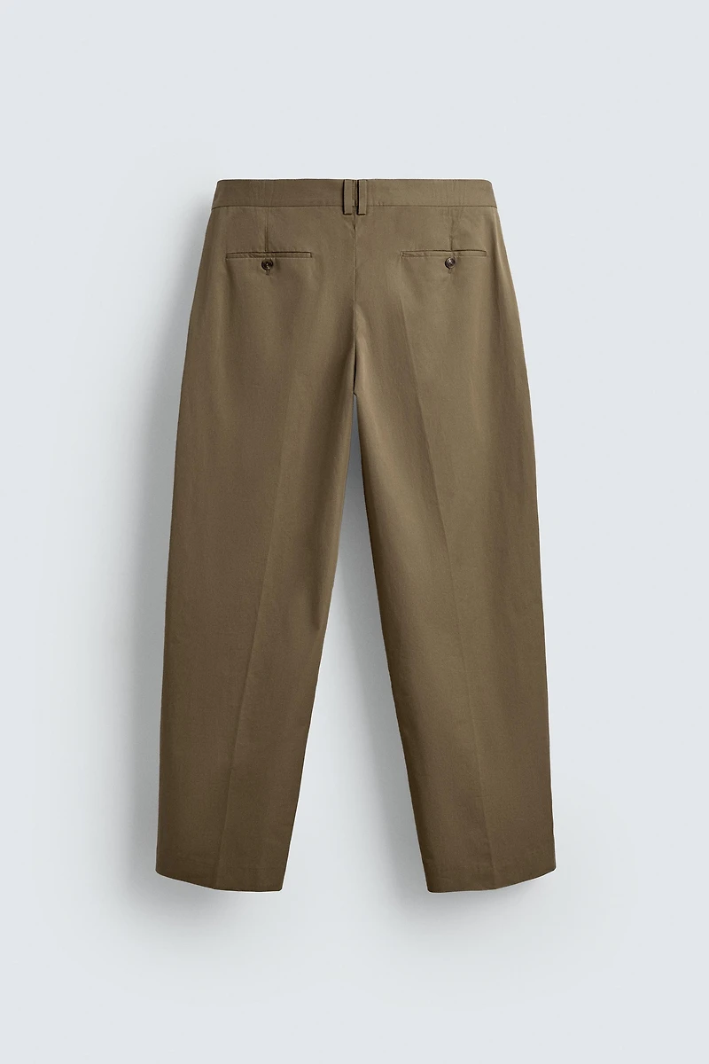 LIMITED EDITION RELAXED FIT PLEATED PANTS