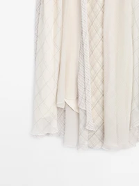 Jupe midi asymétrique à carreaux