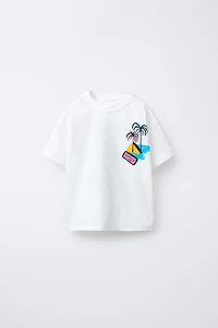 T-SHIRT IMPRIMÉ PALMIERS