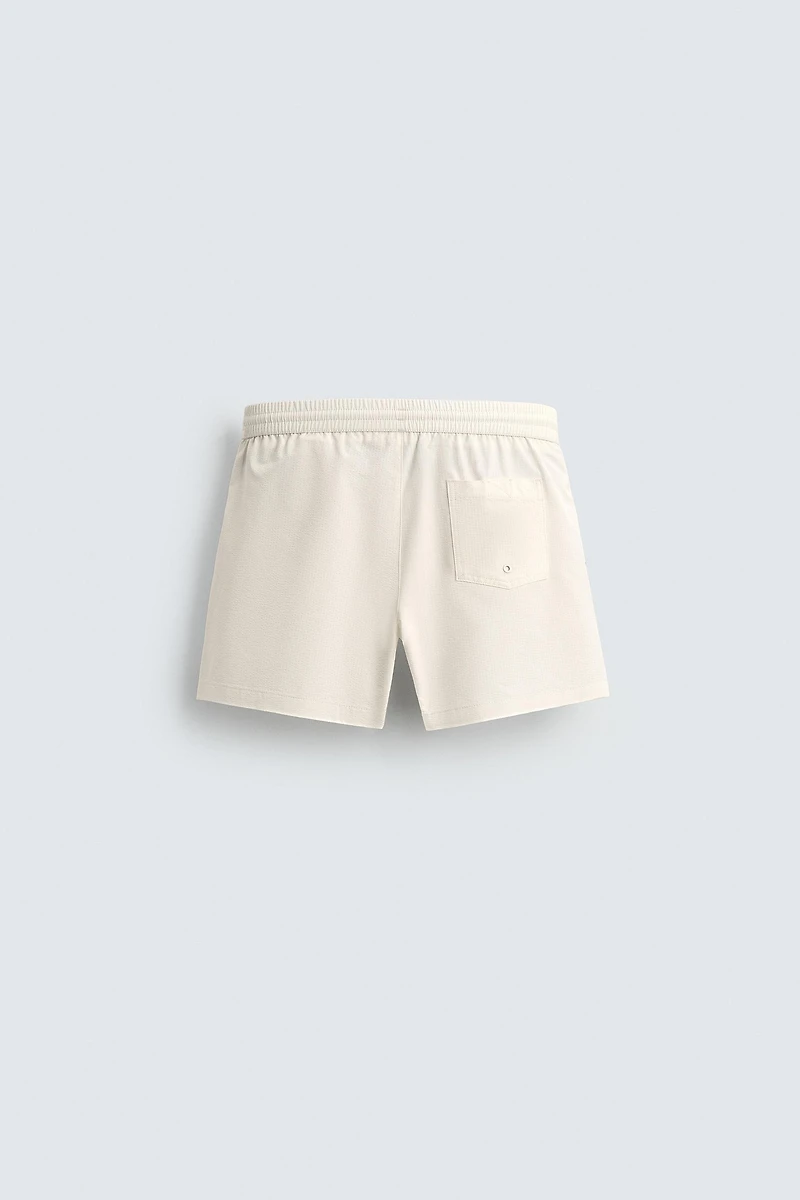 SEERSUCKER SWIM TRUNKS