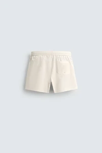 SEERSUCKER SWIM TRUNKS