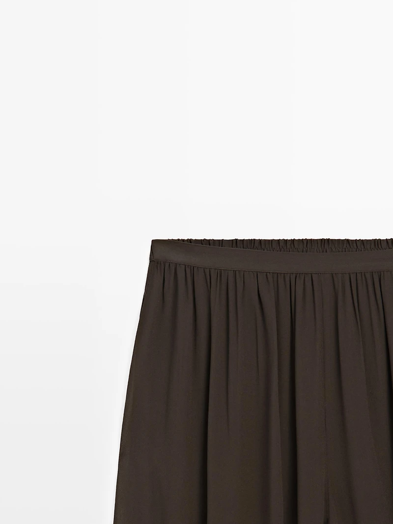 Pantalon bouffant semi-transparent avec boutons