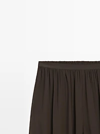 Pantalon bouffant semi-transparent avec boutons