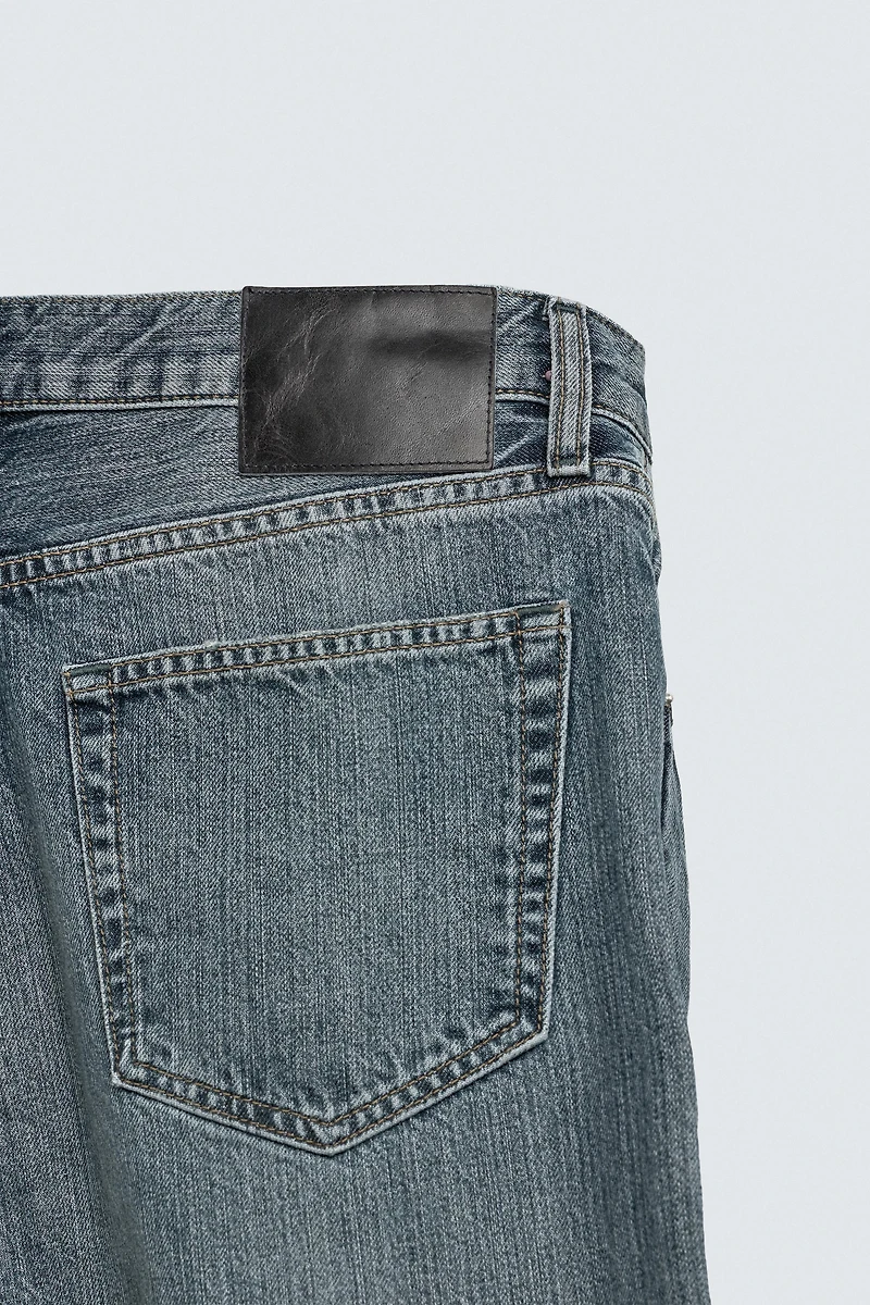STRAIGHT FIT BOOTCUT SLIT JEANS
