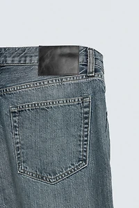 STRAIGHT FIT BOOTCUT SLIT JEANS