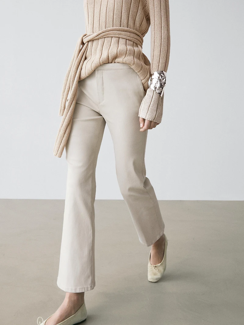 Mid-waist waxed flared pants