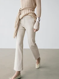 Mid-waist waxed flared pants