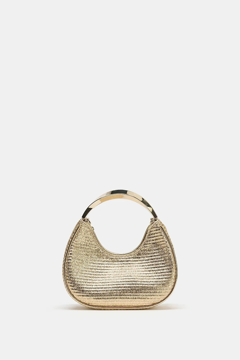 BAG WITH METALLIC HANDLE DETAIL
