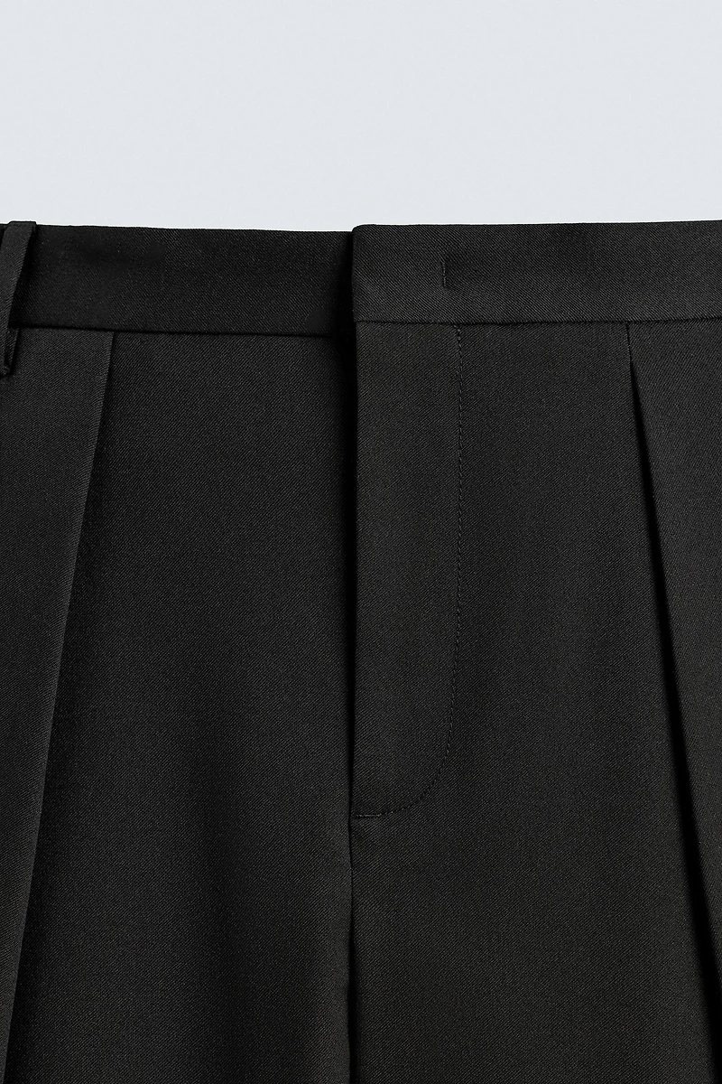PLEATED WIDE FIT PANTS