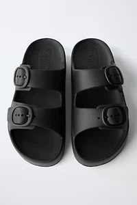 RUBBERIZED BUCKLED SANDALS