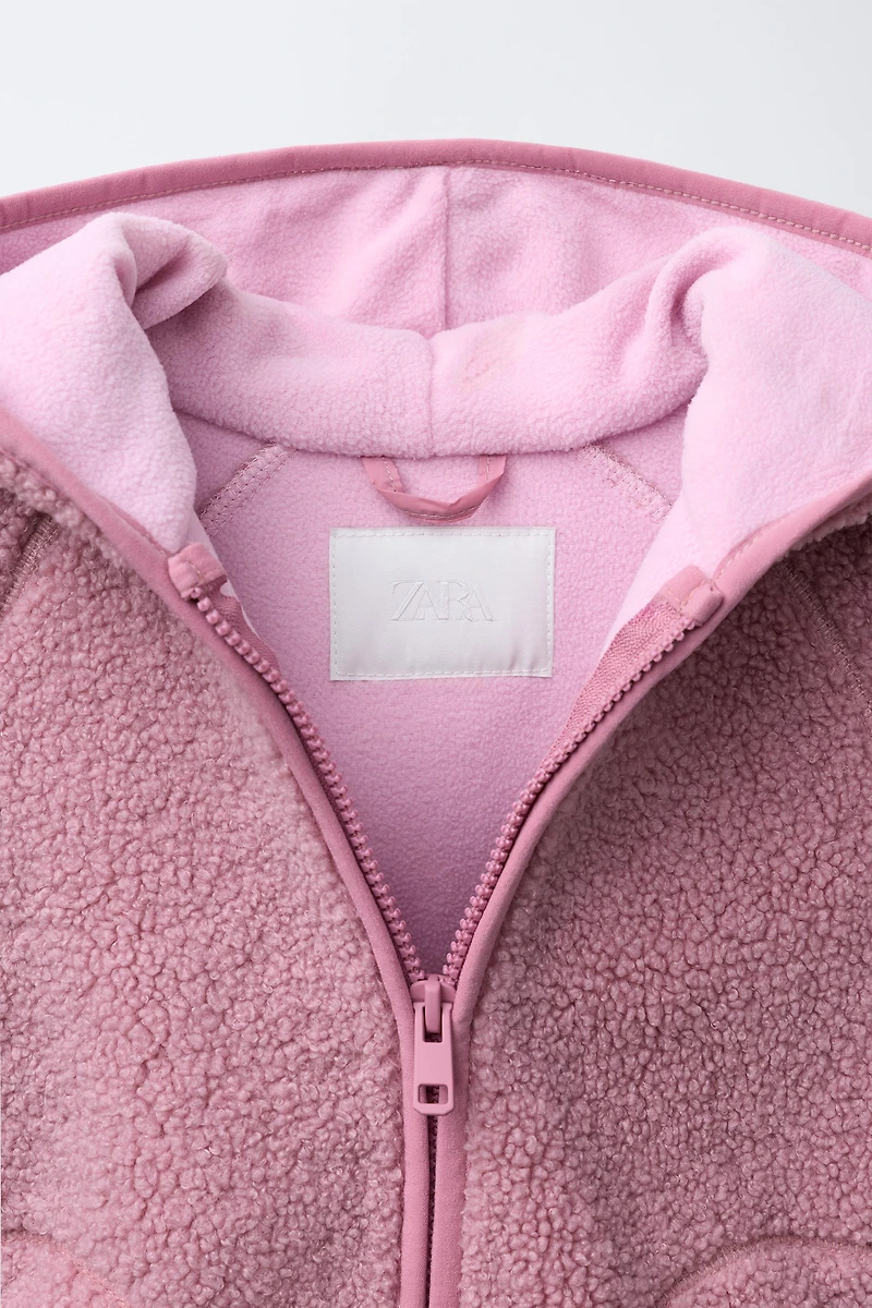 VESTE EFFET MOUTON À CAPUCHE