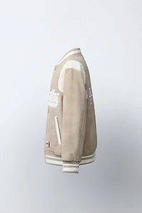 BLOUSON BOMBER EFFET DAIM AVEC INSCRIPTION