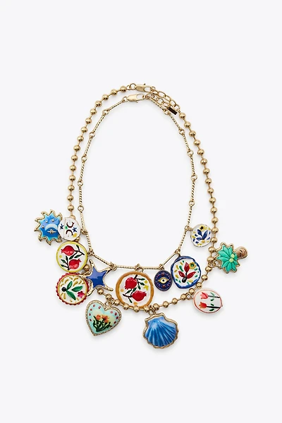 LOT DE 2 COLLIERS PALMIER FLEURS RÉSINE
