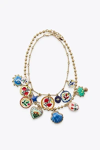 LOT DE 2 COLLIERS PALMIER FLEURS RÉSINE
